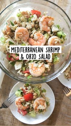 shrimp and rice salad in a glass bowl on a wooden table next to two plates with silverware