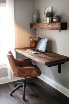 a laptop computer sitting on top of a wooden desk next to a chair and shelf