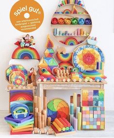 an assortment of colorful wooden toys on display