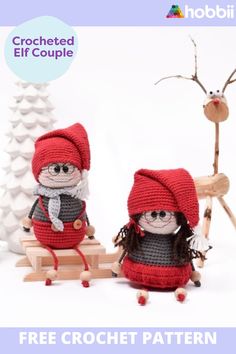 two crocheted gnomes sitting next to each other