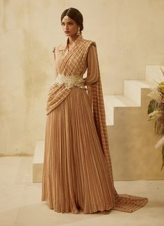 Bhumika Sharma | Nude Nukta Jumpsuit Saree With Belt | INDIASPOPUP.COM Jumpsuit Saree, Ethnic Jumpsuit, Bhumika Sharma, Nude Fabric, Saree With Belt, Blouse Yoke, Embroidered Belt, Indian Inspired, Saree Dress