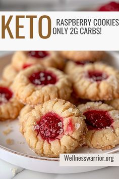 raspberry cookies on a white plate with the words keto written below it