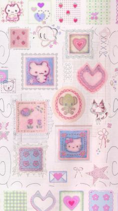 the wall has many different designs on it, including hearts and animals in squares with dots