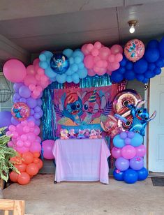 a birthday party with balloons and decorations