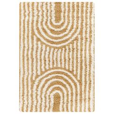 a beige rug with circles and stripes on the floor in front of a white background