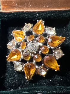 Metal a d citrine glass brooch Yellow Brooch Jewelry For Wedding, Yellow Wedding Jewelry Brooch, Elegant Yellow Brooches For Party, Elegant Yellow Party Brooches, Elegant Yellow Party Brooch, Orange Brooch Jewelry For Formal Occasions, Yellow Brooch For Formal Occasions, Formal Orange Brooch Jewelry, Orange Brooch Jewelry For Party