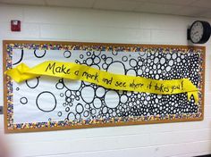 a bulletin board with a yellow ribbon on it that says make a mark and see where you are