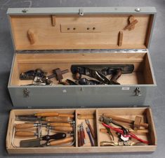 an open tool box filled with lots of tools