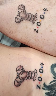 two people with tattoos on their legs and one has an image of a teddy bear