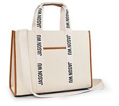 Sleek and sporty, this coated canvas tote bag has all the room you need to carry your necessities with ease. From Jason Wu. Sporty Canvas Bag For Weekend, Sporty Large Capacity Shoulder Bag For Shopping, Sporty Rectangular Canvas Shoulder Bag, Sporty Canvas Tote Bag, Sporty Canvas Bag With Large Capacity, Sporty Canvas Tote Bag For Everyday Use, Sporty Large Capacity Canvas Tote Bag, Sporty Canvas Bags For Daily Use, Sporty Everyday Canvas Tote Bag