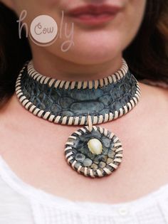 This beautiful handmade leather necklace is made from the finest quality blue snake print leather. It has beautiful sea shell incorporated into it's design. This hippie necklace is adjustable at the back so it fits all sizes. Handmade Leather Choker Necklace, Blue Leather Jewelry For Festivals, Artisan Blue Leather Jewelry, Handmade Leather Necklaces, Medieval Necklace, Pagan Necklace, Necklace Shell, Blue Snake, Necklace Leather