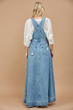 The light denim overall dress features a 34" inseam, sleeveless design, buckle closure, adjustable western boho straps, kangaroo pocket, and wide leg. Both front and back pockets provide ample storage for your everyday essentials. Skirt Length 43" S-28"M-30"L-32" Bohemian Overalls With Pockets For Spring, Bohemian Denim Dresses With Pockets, Medium Wash Denim Overall Dress For Spring, Spring Medium Wash Denim Overall Dress, Casual Denim Pinafore Dress With Pockets, Casual Medium Wash Pinafore Dress For Spring, Medium Wash Denim Overall Dress With Pockets, Denim Overall Dress, Western Boho