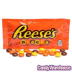 reese's pieces candy wrapper with candies on the front and back side