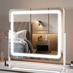 a mirror that is sitting on top of a dresser next to a night stand with a lamp