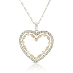 A white gold heart holds a stylized rose gold heart, with diamonds lining each open heart, to form a perfectly romantic pendant with a warm two-tone look. Double Heart Rose Gold-plated Necklace, Pink Heart Pendant Jewelry With Diamond Accents, Gold-tone Heart Shaped Metal Necklace, Valentine's Day Heart-shaped Diamond Necklace With Accents, Diamond Heart Necklace, Heart-shaped Diamond Accented Pendant Necklace For Valentine's Day, Feather Ring, Heart Necklace Diamond, Diamond Jewel