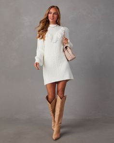 We love the cozy western vibes of the Wendy Fringe Trim Mini Sweater Dress. Appropriate for fall outings and beyond with bold, fringe trim along the bust area and cable knitting throughout. This mini-length dress has long sleeves and looks amazing with tall western boots. Fitted High neckline Fringe trim Non-stretch knit fabrication 100% Acrylic White Sweater Dress With Boots, Sweater Dress With Boots, Shower Dress For Bride, Tall Western Boots, Fall Outings, Tall Western Boot, White Sweater Dress, High Boots Outfit, Western Vibes