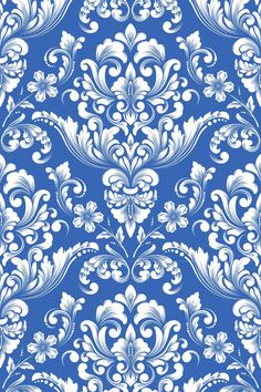 an ornate blue and white wallpaper pattern