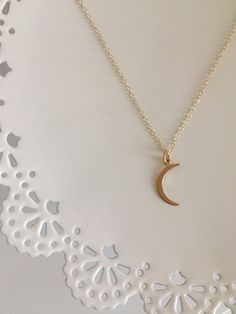 Looking for an amazing necklace to wear alone or layer? Here you are, my dears!  This gold necklace features a large gold crescent moon pendant. Pendant is set on a gold filled cable chain and ends with gold filled finishes. details Chain, details, clasp and all small metal details are gold filled. Moon pendant is 24K gold dipped over sterling silver. Sterling silver metals are always an option. Just click the link above or order at the drop box at check out. measurements Crescent moon charm mea Gold Crescent Moon Charm Necklaces, Gold Moon Phase Charm Necklace, Gold Crescent Moon Phase Charm Necklace, Everyday Crescent Moon Phase Charm Necklace, Gold Moon Charm Necklaces, Gold Charm Necklace With Moon Phase, Gold Half Moon Charm Necklace With Moon Phase, Gold Moon Charm Necklace With Delicate Chain, Gold Half Moon Charm Necklace