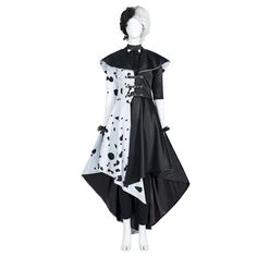 a mannequin dressed in black and white with polka dots on it's dress