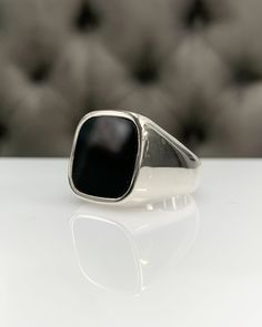 Men Ring with Onyx, Black Pinky Signet Ring, Square Shape Genuine Gemstone, Stylish Gold / Silver Ring, Handmade Jewelry, Best Gift for Him ◎ Details ◎ ○ Material 14K Solid Gold or 925 Sterling Silver Weight of Ring : approx 18.00 gr Height of Ring : approx 5.30 mm ○ Upgrade to Solid 18K Gold, please click the link below: https://www.etsy.com/listing/962826004 ○ Gemstone Natural Onyx Gemstone approx. 15 mm x 15 mm 4.23 ct Made to Order HANDMADE ITEM ○ For Men Collection : https://etsy.me/2PmKJMW Modern Onyx Signet Ring For Gift, Modern Onyx Signet Ring Gift, Modern Black Enamel Rings For Gifts, Timeless Onyx Gemstone Rings, Onyx Open Ring For Formal Occasions, Formal Onyx Rings With Polished Finish, Formal Onyx Open Ring Jewelry, Luxury Hallmarked Onyx Rings, Classic Black Rings With Polished Edges