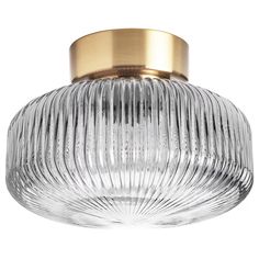 a glass ceiling light with gold trimmings and a metal fixture on the top