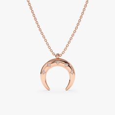 Hailie Embrace the magic of the moonlight with this captivating Diamond Star-Studded Crescent Horn Necklace. A crescent moon shimmers in gleaming gold (available in yellow, white, or rose gold), adorned with a scattering of sparkling diamonds that twinkle like stars. - Handmade - Solid Gold - Natural Diamonds- Dimensions of Horn: 13.5 x 13.5 mm- Total Diamond Carat Weight: 0.03 ctw All pieces come beautifully boxed in suede pouches you can always use when traveling! Symbol Of Luck, Crescent Necklace, Horn Necklace, Necklace Layering, Diamond Star, Bridal Bands, Diamond Carat, Moon Star, Star Studs