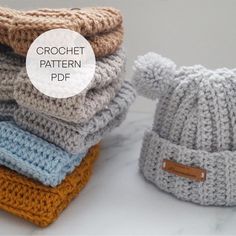 several knitted hats are stacked on top of each other with the text crochet pattern