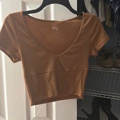 Brown Pacsun Crop Top. V Neck. Never Worn Brand New With Tags Brown Crop Top For Vacation, Brown Summer Crop Top For Vacation, Brown Fitted Crop Top For Vacation, Summer Brown Crop Top For Vacation, Brown Casual Crop Top For Beach, Casual Brown Crop Top For Beach, Chic Brown Crop Top For Vacation, Trendy Brown Crop Top For Day Out, Summer Vacation Brown Crop Top