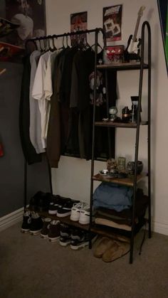 a rack with shoes and other items in a room