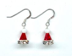 These cute little pair of Earring made with Genuine Swarovski crystal limited edition beads. Choice of Sterling silver component or Gold filled 14K Component. Simple addition to your everyday outfits through out this Holiday season An inspired and attractive gift giving idea. Diy Christmas Earrings, Christmas Jewelry Diy, Crystal Christmas Tree, Bijoux Fil Aluminium, Crystal Christmas, Beaded Jewlery, Holiday Earrings, Christmas Tree Earrings, Simple Addition