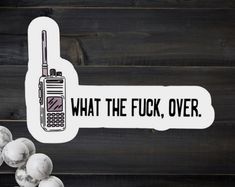 a sticker that says what the fock, over with an image of a cell phone