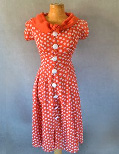 This fabulous 1950's dress is perfect for any summer soiree, event, or even wedding.  Bust= 32in Waist =28in  Shoulder to hem=40in Back Zipper= 16in 1950s Style Polka Dot Vintage Dress, 1950s A-line Vintage Summer Dress, Fitted Summer Vintage Dress Tea Length, Retro Tea-length Dresses For Vintage Events, Fitted Vintage Dress For Summer, Tea Length, Retro Polka Dot Dress For Evening, Summer Polka Dot Dress For Wedding, Fitted Tea-length Vintage Dress For Summer, Fitted Tea-length Summer Vintage Dress