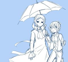 two people standing under an umbrella in the rain