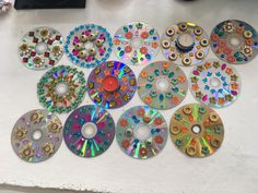 there are many different cd's on the table together, including one for each disc