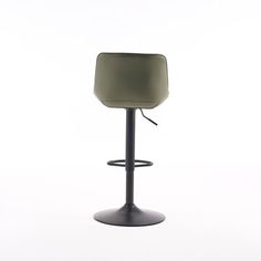 a green stool sitting on top of a metal base