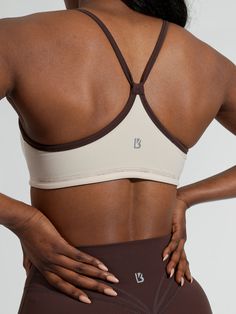 Features: Racerback straps No bust pads Details: Fabric: NuBre (Nylon/Spandex) Light Support Level Description: This Reversible Sports Bra is reversible with two different colored sides. This light support sports bra has no bust pads and is a great option for days you need less support. Its strappy back makes it the perfect lightweight racer back sports bra for anyone who wants endless options for outfits. Glute Bands, Activewear Trends, Pole Wear, Fitness Wear Outfits, Non Slip Socks, Twisted Sister, Fitness Wear, Workout Outfits, Activewear Brands