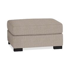 the footstool is made out of fabric and has black legs, with a beige ottoman