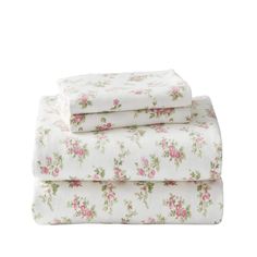 three sheets with pink flowers on them