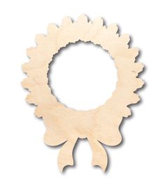 an unfinished wooden wreath with leaves on the front and sides, cut out from plywood