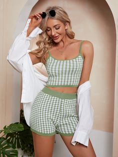 Make an on-trend style statement with your summer wear in this knit set that features a houndstooth print and a slouchy fit. Size Guide: Jane is 5’6” tall, and has a 32.2” bust, 23.6” waist, & 35.4” hips. She is wearing a S / US 4 / AU 8. This crop top set is true to size. Feature: Includes singlet top and matching shorts (two pieces total) Material: 70% cotton / 30% polyester Care Instructions: Machine wash / Cold hand wash Spring Gingham Tops For Loungewear, Casual Houndstooth Tops For Spring, Casual Houndstooth Summer Top, Casual Houndstooth Top For Summer, Summer Casual Houndstooth Top, Summer Cotton Houndstooth Pattern Tops, Crop Top Set, European Women, Crop Top And Shorts