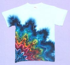 a tie dye t - shirt with an abstract design