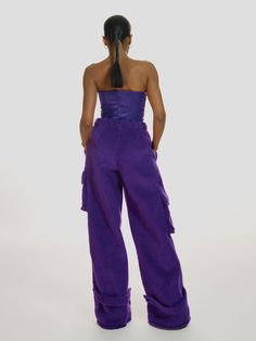 Introducing our Fluffy pants in Purple - a standout addition that infuses your wardrobe with vibrant colour. Crafted from an ultra-soft polar fleece in a rich shade of purple, these pants are poised to make a statement. Flattering high-waisted design and generously-sized pockets on both sides. The party goes on and on. Whether you prefer heels or flats, their versatile length accommodates your choice. For added convenience, you can secure the hem with detachable ribbons. These pants are as cozy Fluffy Pants, Shade Of Purple, Miranda Priestly, Justine Skye, Slow Fashion Brands, Dynamic Duo, Fitted Trousers, Polar Fleece, High Waisted Trousers