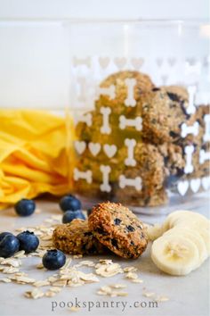 blueberry oatmeal muffins with banana slices on the side and some other ingredients