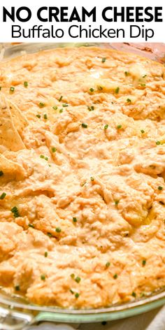 no cream cheese buffalo chicken dip in a glass dish