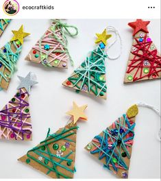 christmas tree ornaments made out of paper and string