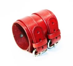 Unique red leather bracelet! Very comfortable & easy to wear. Size: Wirst size: 6-8.5 inches(16-22cm) Width: 2.55 inch (6.5 cm) Color: red. Material: genuine leather(leather is produced in Italy). If you have any questions please write! Adjustable Red Leather Bracelet, Handmade Red Leather Bracelet, Red Leather Bracelet For Gift, Red Leather Bracelet As Gift, Red Adjustable Leather Bracelet, Handmade Adjustable Red Leather Bracelet, Adjustable Red Cuff Bracelet As Gift, Adjustable Red Leather Strap Bracelet, Adjustable Red Bracelet With Leather Strap