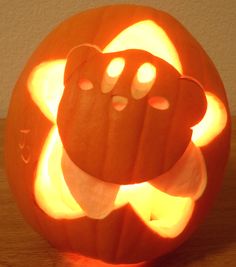 a pumpkin carved to look like a bear