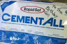 a cement sign with the words cement all written in blue and white ink on it