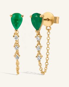 Earrings featuring a 0.09tcw SI, G-H Diamond waterfall coming out from under ~0.7-0.8ct Emeralds. A chain connects at the back, creating a continuous, fluid look. Evening Yellow Gold Jewelry With Emerald, Evening Yellow Gold Emerald Jewelry, Elegant Single Emerald Earring, Fine Jewelry Earrings For Evening, Tarnish Resistant, Tarnish Resistant Fine Jewelry Earrings For Evening, Tarnish Resistant Elegant Emerald Jewelry, Fine Jewelry Emerald Teardrop Earrings, Single Emerald Earring In Yellow Gold, Emerald Teardrop Earrings Fine Jewelry