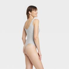 Update your separates closet with the Cotton Stretch Tank Bodysuit from Auden™. The tank bodysuit is made from soft and stretchy fabric to give you a comfortable fit that moves with you, and it boasts opaque lining for confident wear. With just the right touch of on-trend style, you can sport the pullover bodysuit with everything from jeans to shorts to skirts, and it's a great layering piece. Auden™: Fit for you in every way. Tank Bodysuit, Trend Style, Round Pendant, Body Suit, Layering Pieces, Stretchy Fabric, Jean Shorts, Layering, Comfort Fit